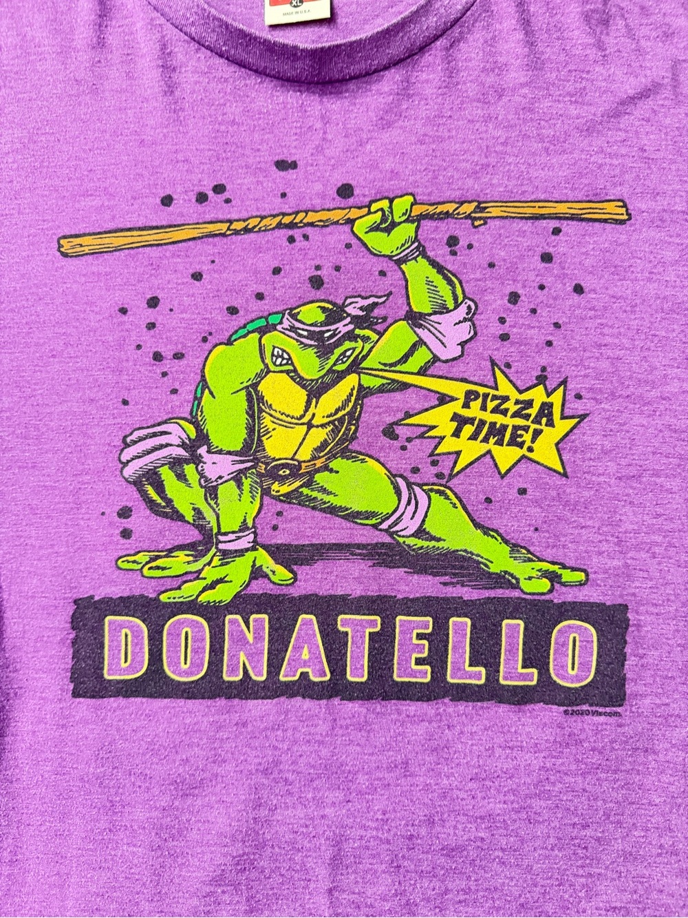 HOMAGE Purple Donatello TMNT Graphic Tee with Neon Green Print